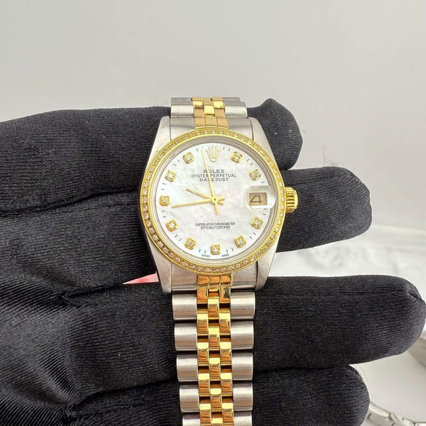 Rolex Datejust 68273 31mm
After market diamond bezel and Mop Dial
Jubilee